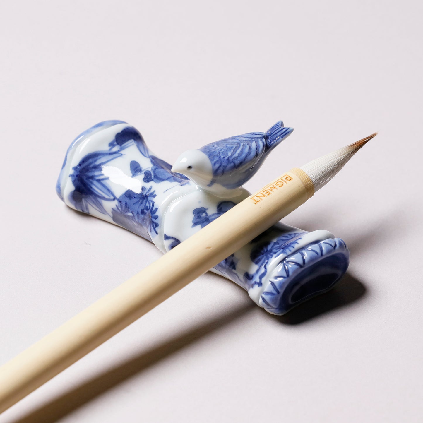 Blue-and-White Brush Rest with Bird Motif